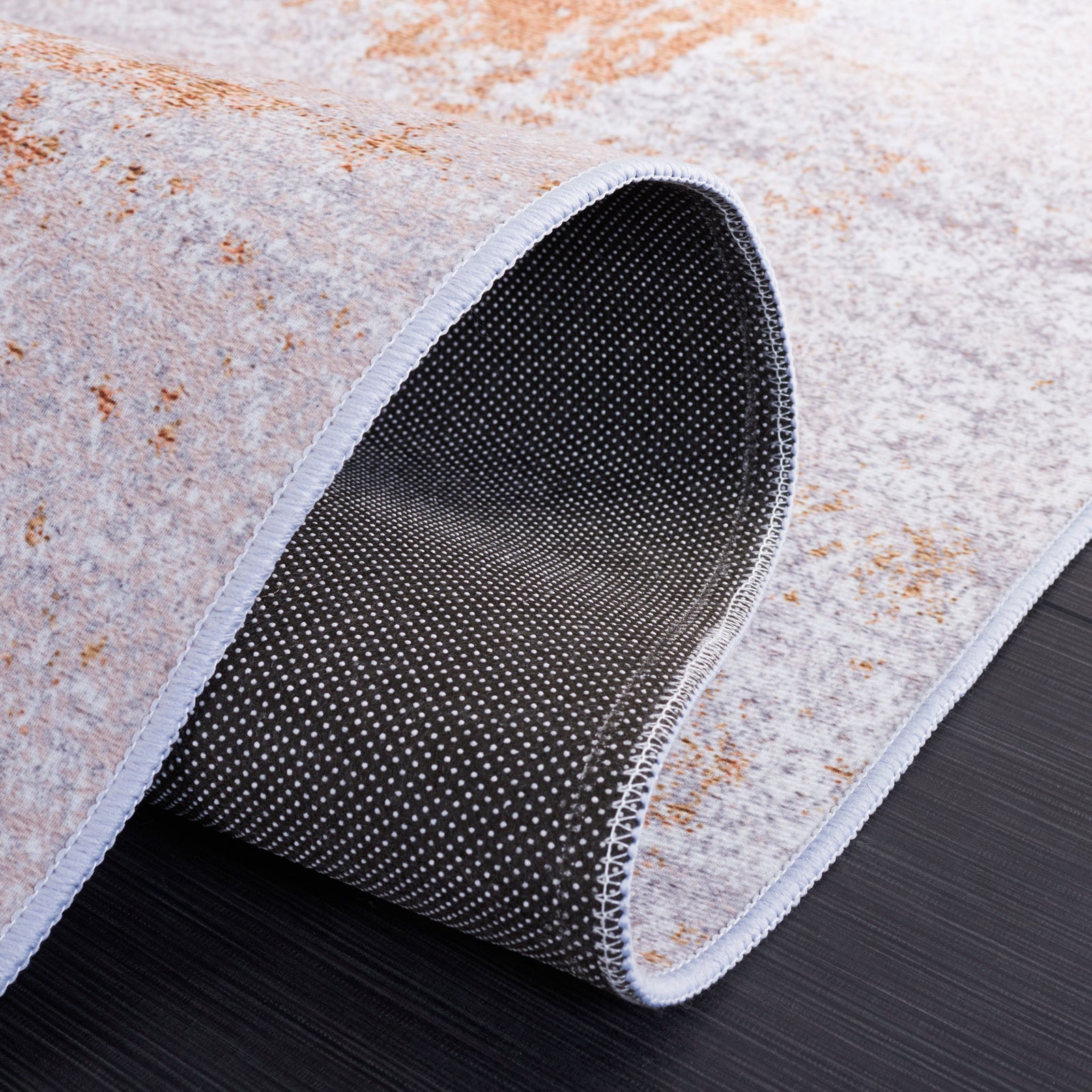 Slip-resistant dotted backing and flexible construction for easy placement and machine-washable care || TAC808P-5 || backing_studio