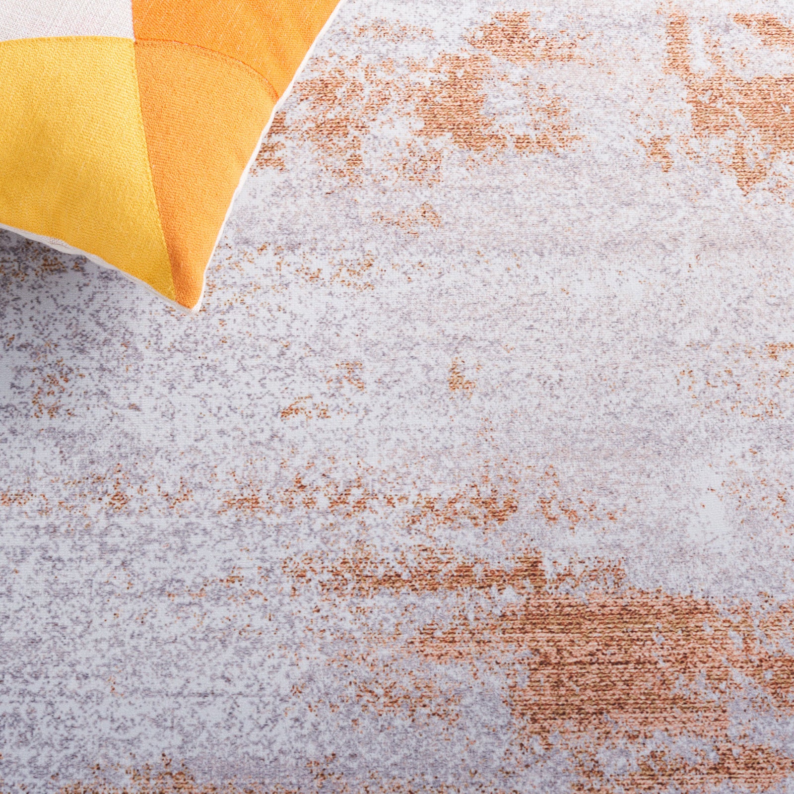 Warm rust accents pop against cool gray tones for a balanced, modern statement || TAC808P-5 || detail_room