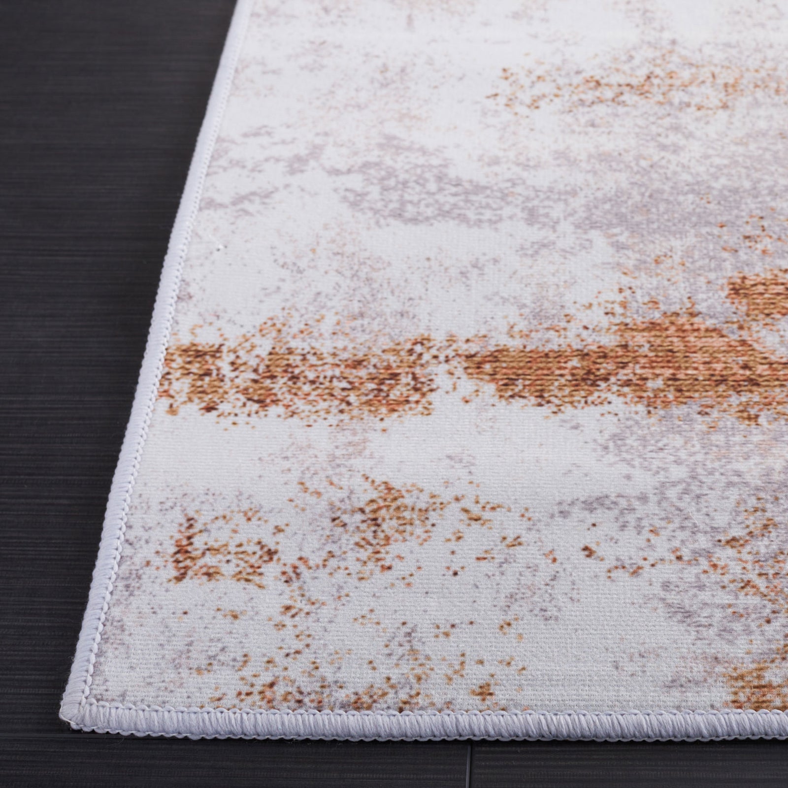 Modern abstract gray and rust area rug with a softly distressed pattern and neatly serged edges || TAC808P-8 || top_studio