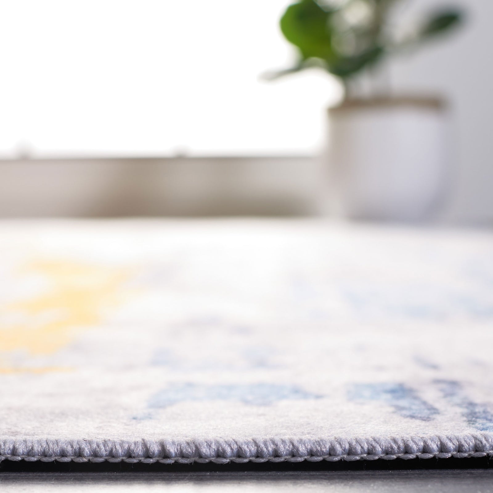Low-profile edge with tightly bound trim for a clean, door-friendly fit. || TAC812F-5 || detail_room