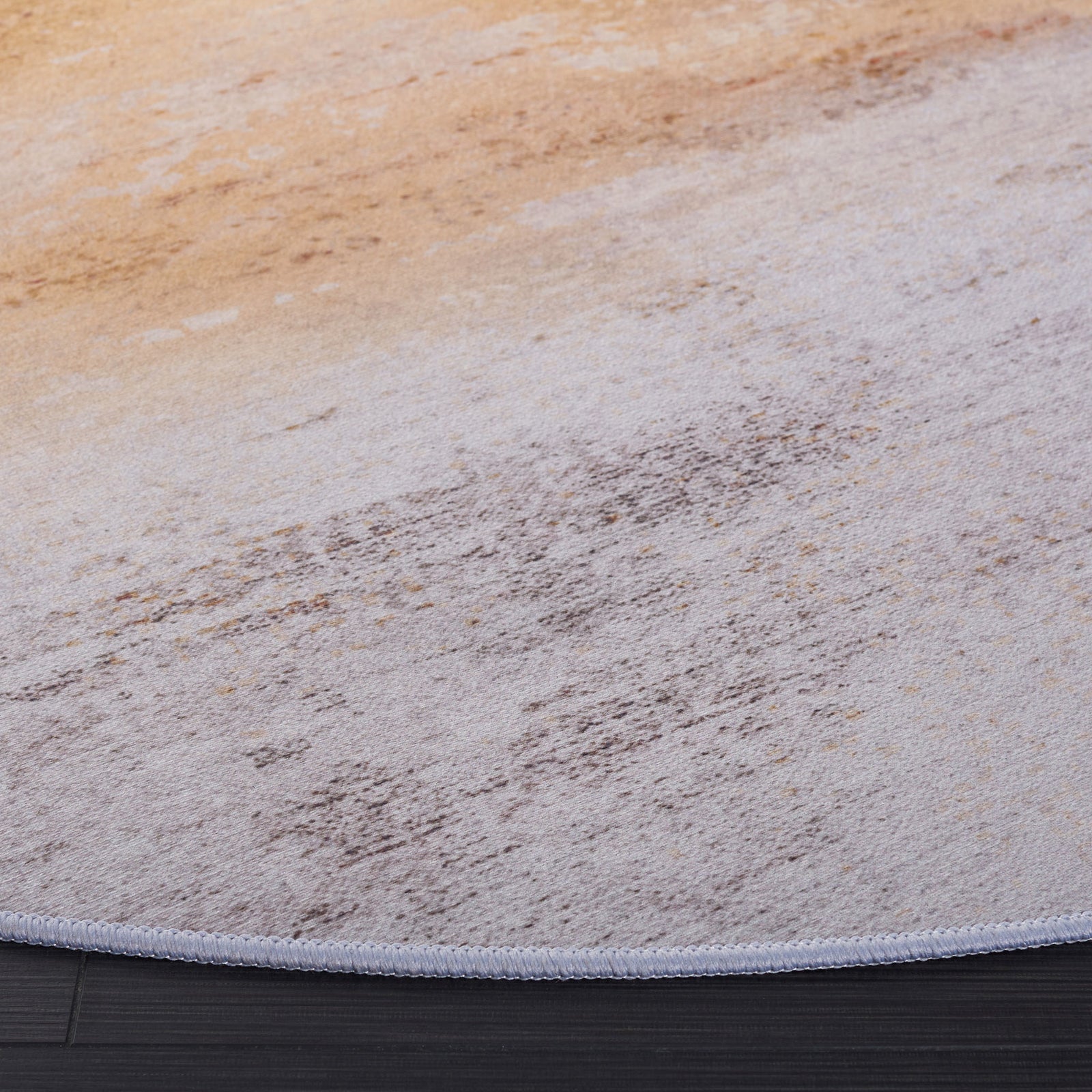 Soft, brushed gray and rust pattern with smooth, low-profile pile and a neatly finished edge || TAC813F-6R || detail_room