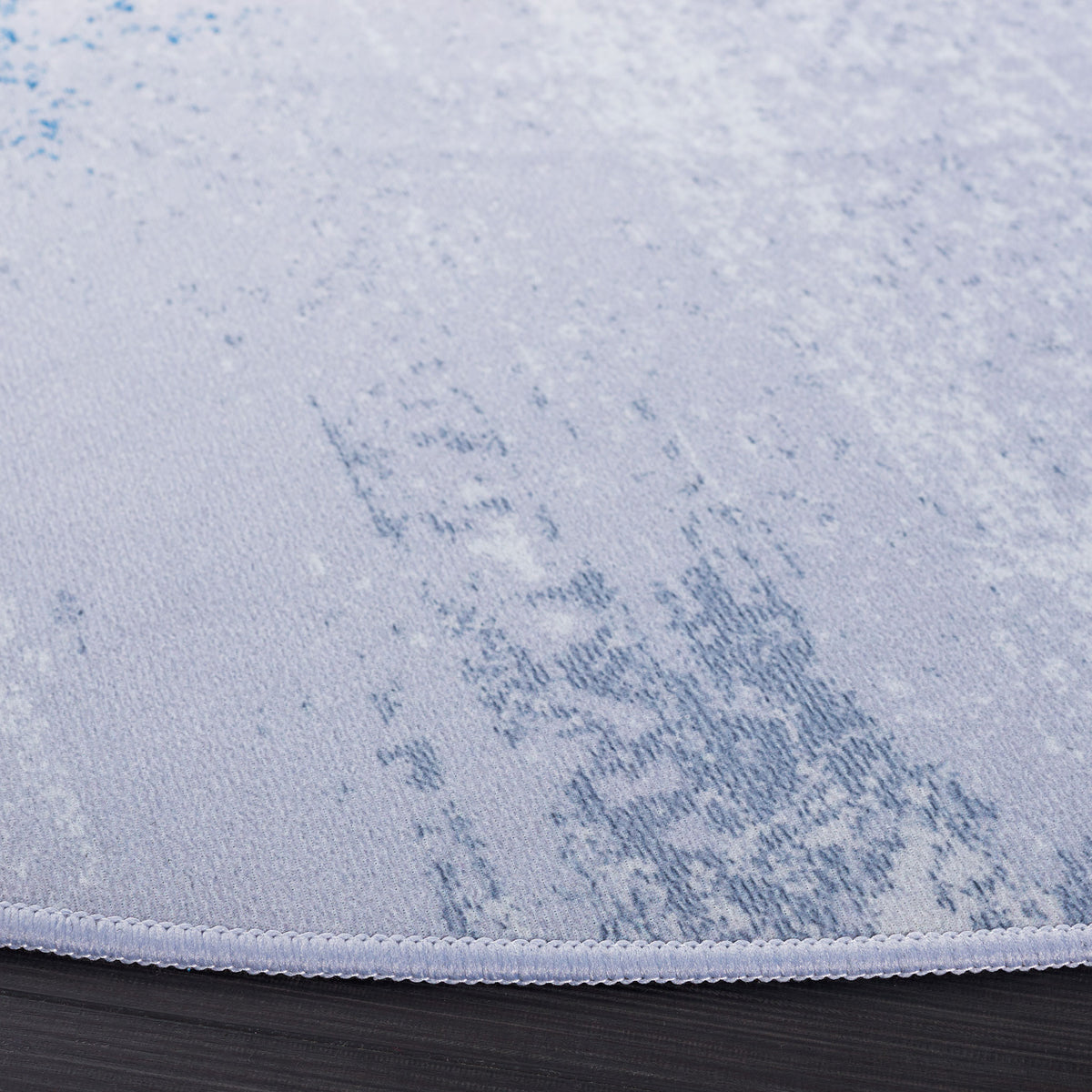Soft low-pile texture and neatly stitched edge in gray and blue || TAC814F-6R || detail_studio
