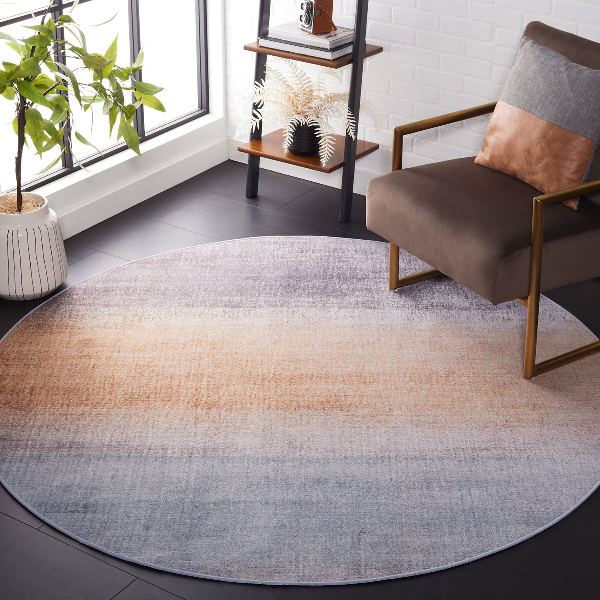 Round gradient rug warms the room with layered gray and rust hues and a clean, tailored edge. || TAC816F-6R || front_angle_room