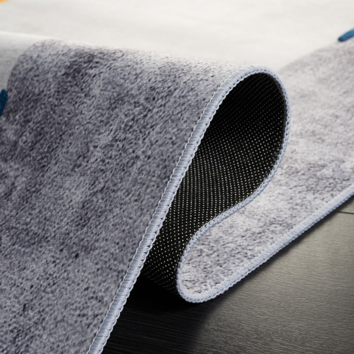 Flexible rug with slip-resistant dot backing and low, cushioned pile for stability and comfort || TAC820F-5 || backing_room