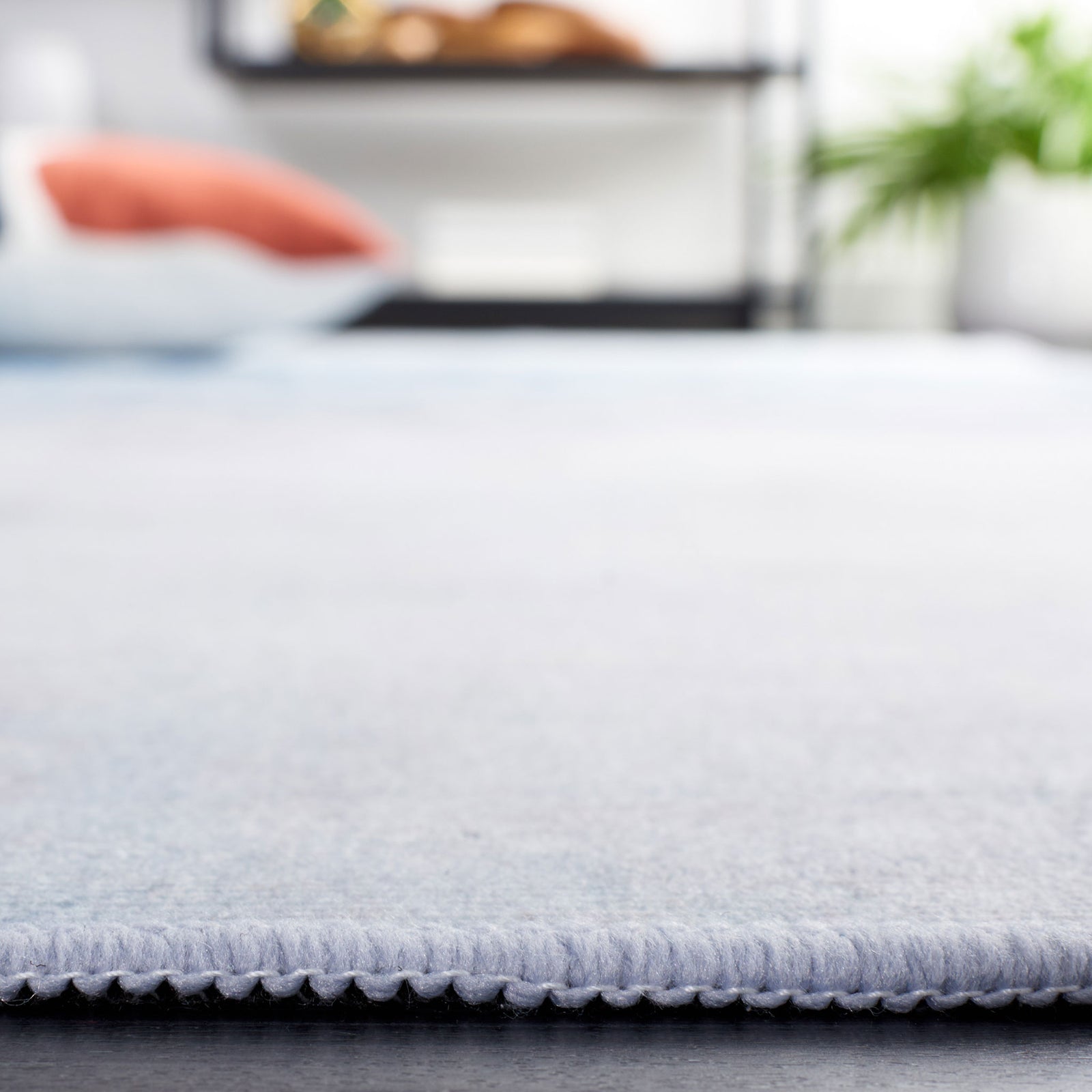 Low, cushioned pile sits flat on the floor for easy walking and cleaning || TAC833F-5 || detail_room