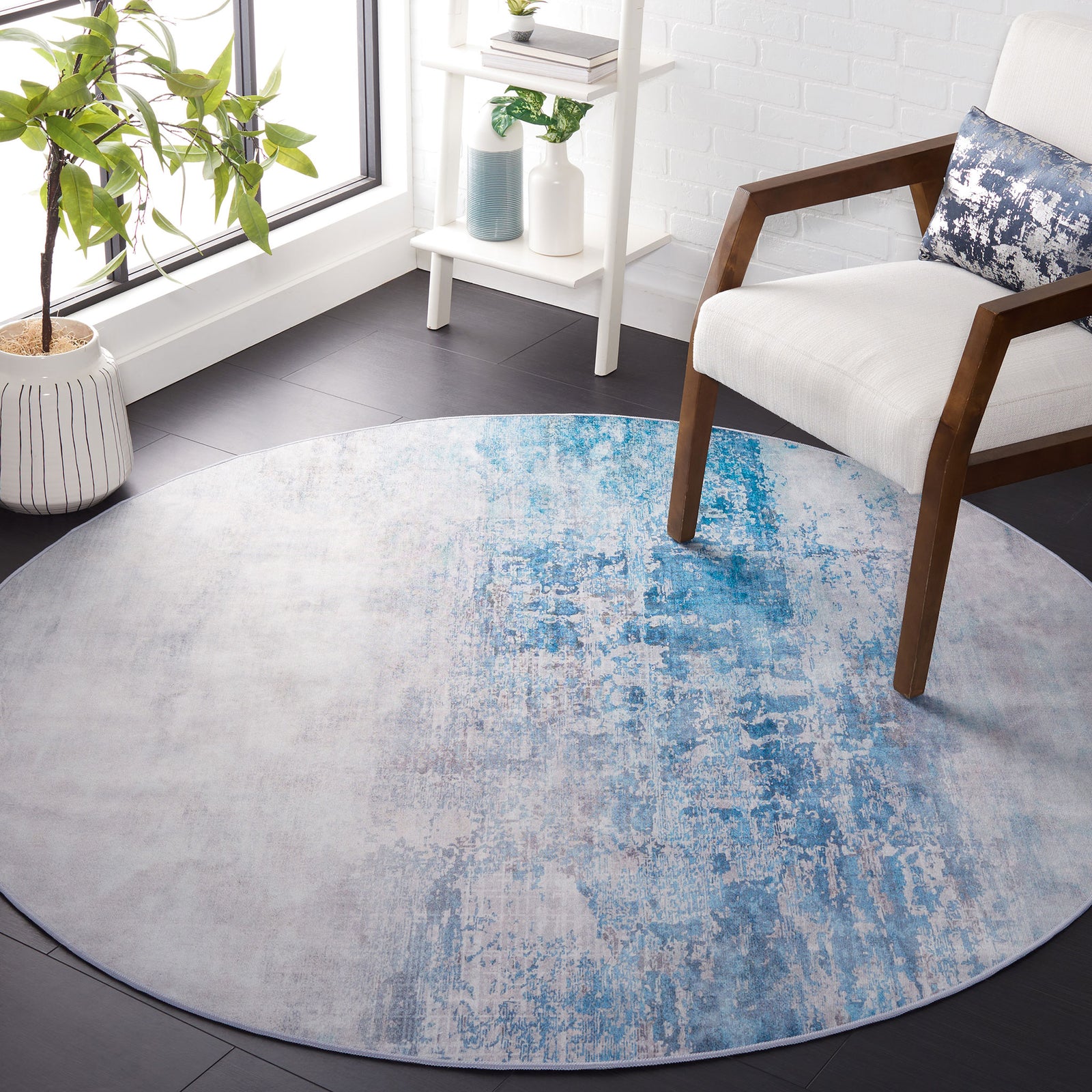 Round abstract rug brings cool gray and blue tones to modern decor || TAC833F-6R || top_room