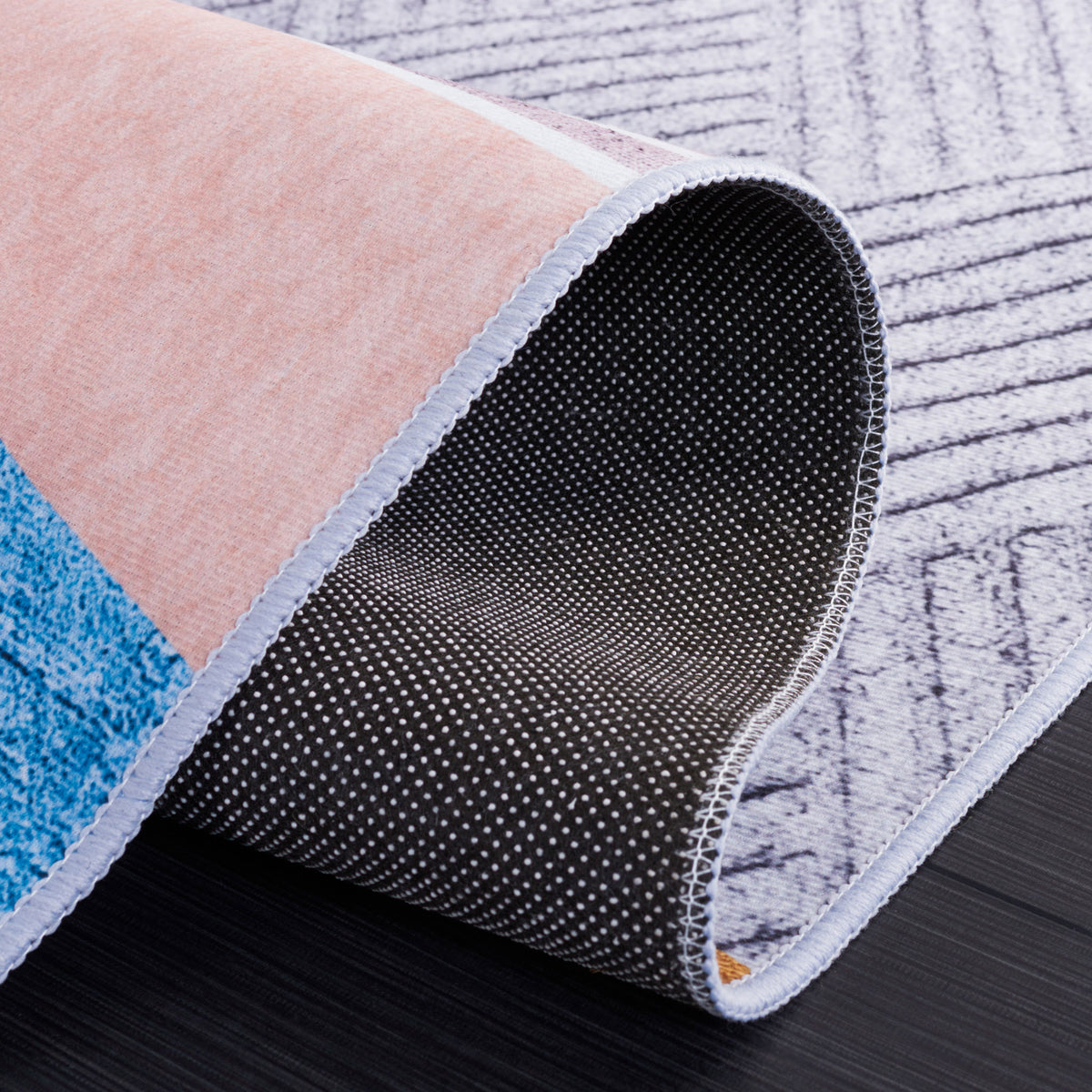 Slip-resistant dot backing with flexible, easy-care construction. || TAC834B-5 || backing_studio