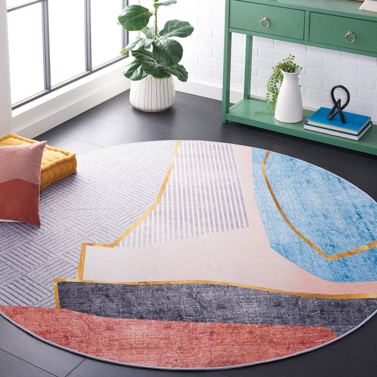 Modern round rug adds bold color blocks and warm gold accents to elevate the living space || TAC834B-6R || front_angle_room