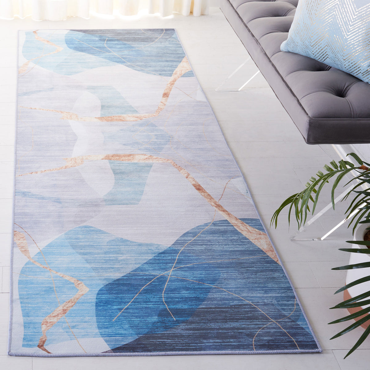 Blue and gold abstract runner brings modern movement and softly blended tones to your space || TAC836M-28 || front_angle_room