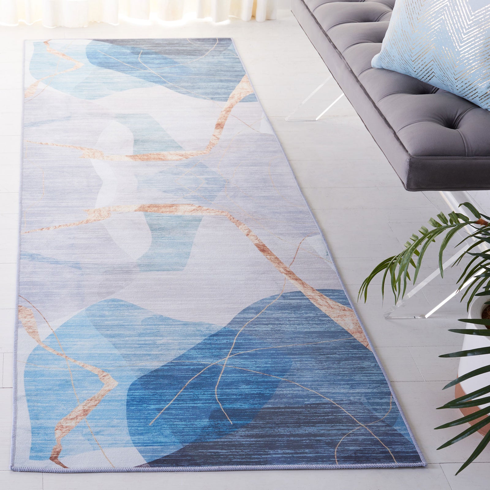 Blue and gold abstract runner brings modern movement and softly blended tones to your space || TAC836M-28 || front_angle_room