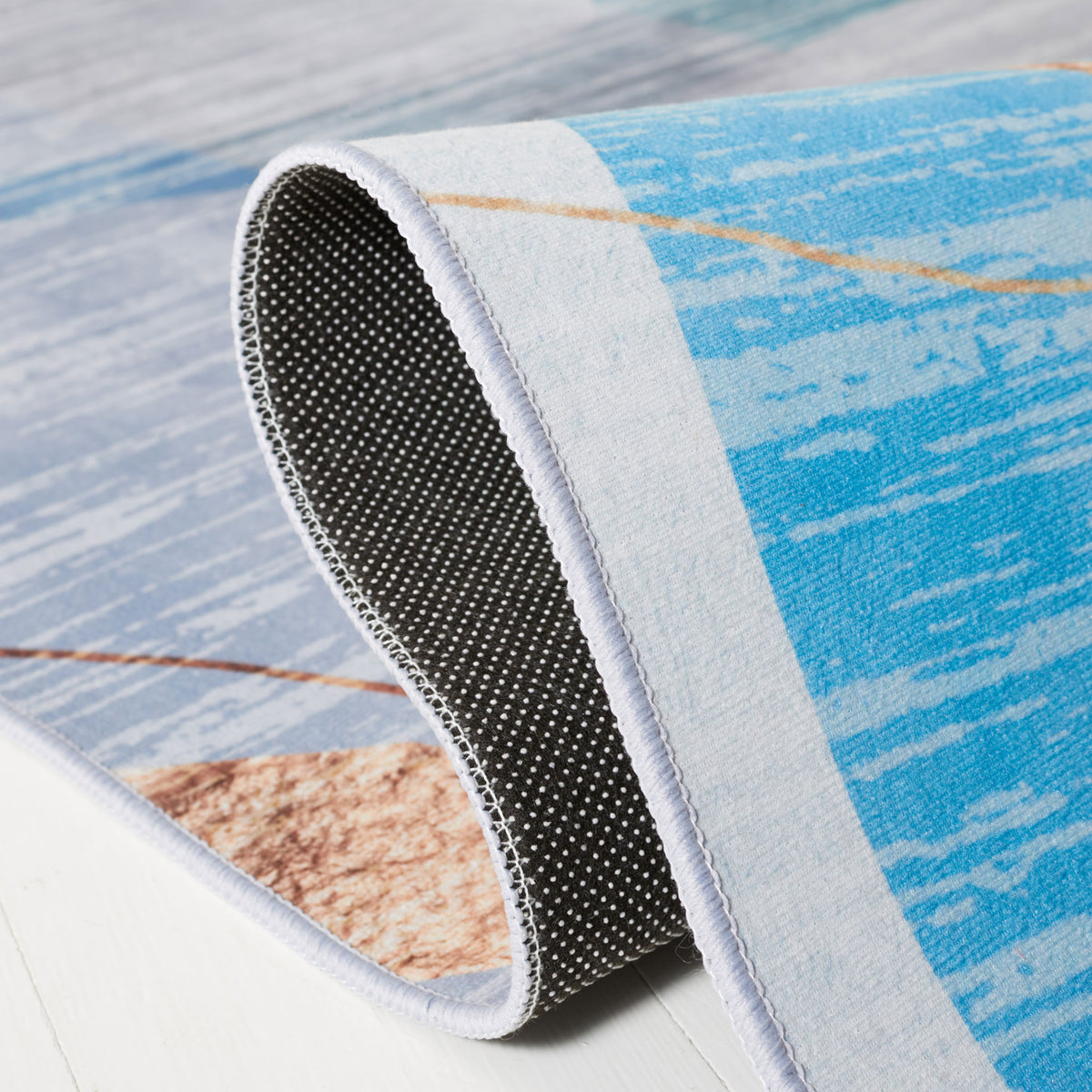 Slip-resistant dotted backing with neatly finished edge for added stability || TAC836M-5 || backing_studio