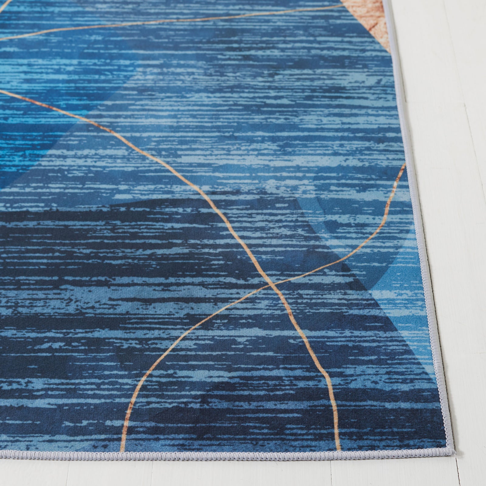 Blue and gold abstract area rug with layered shapes and fine striations for a modern look || TAC836M-5 || top_studio