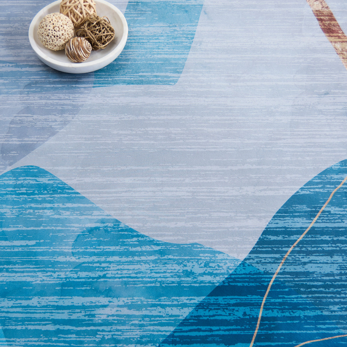Soft striations, layered blues, and fine gold veining create a modern abstract look. || TAC836M-5OV || detail_room