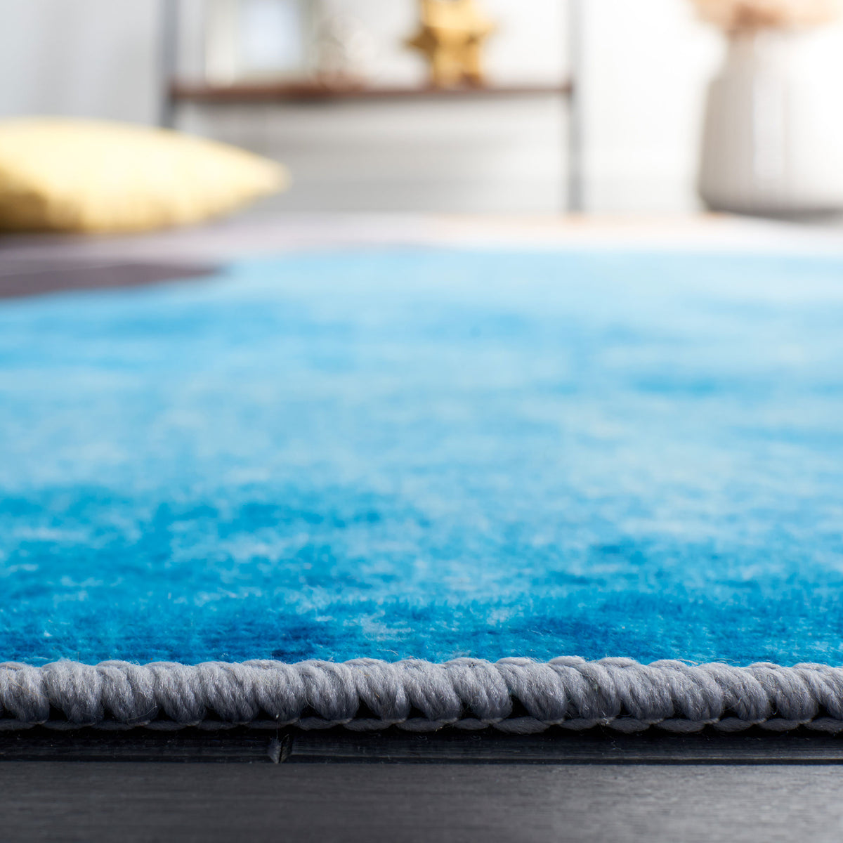 Low-profile edge and velvety surface for a smooth, door-friendly fit || TAC837G-5 || detail_room