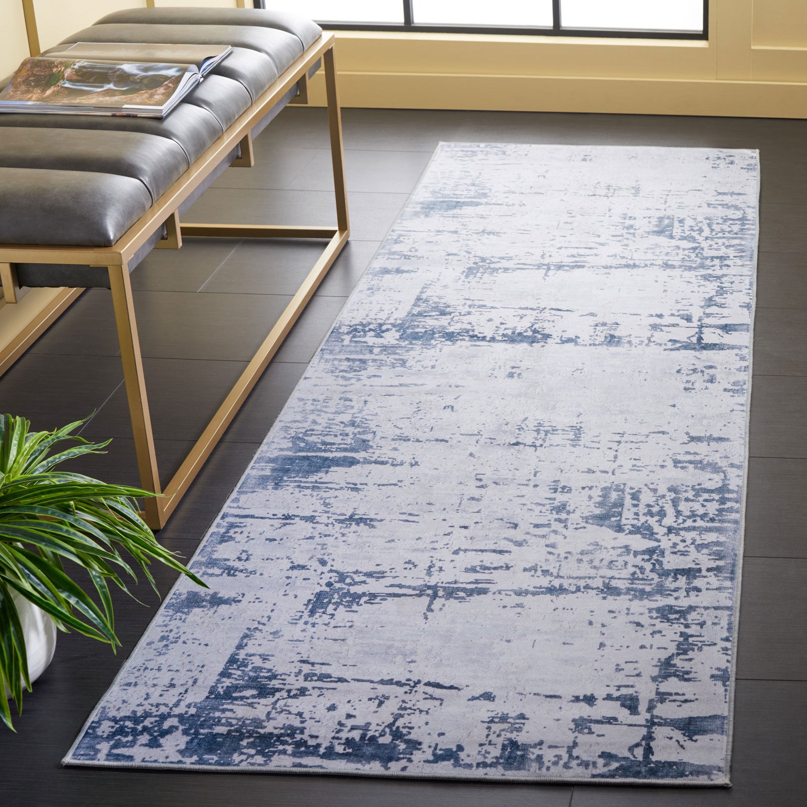 Low-profile washable runner in gray and navy, adding modern texture to hallways with a non-slip base. || TAC864F-28 || front_angle_room