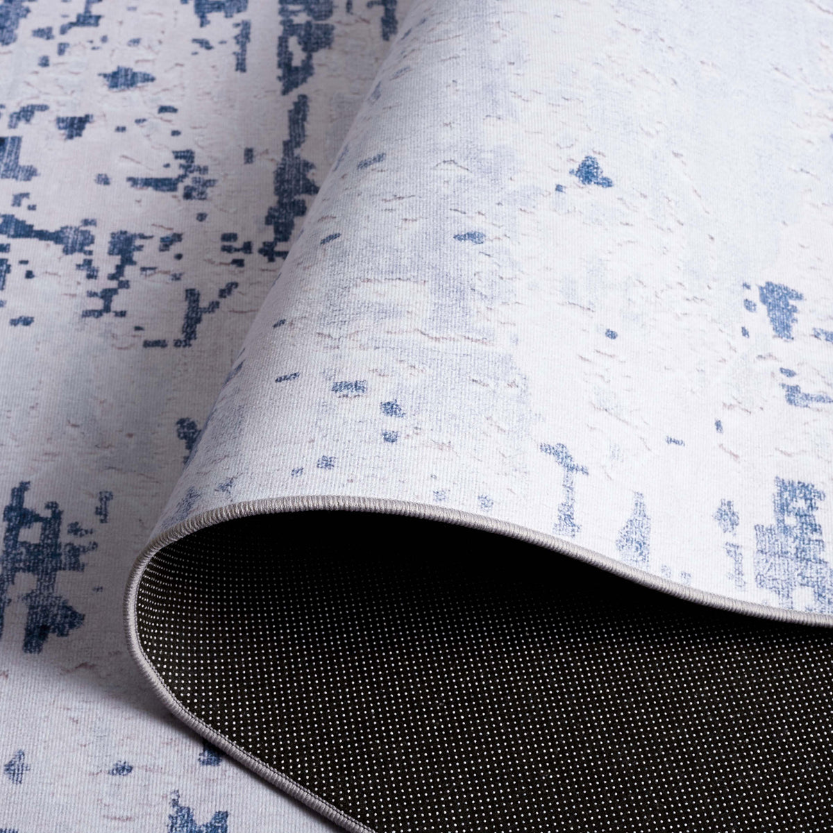 Slip-resistant dotted backing and flexible rug construction || TAC864F-5 || backing_studio