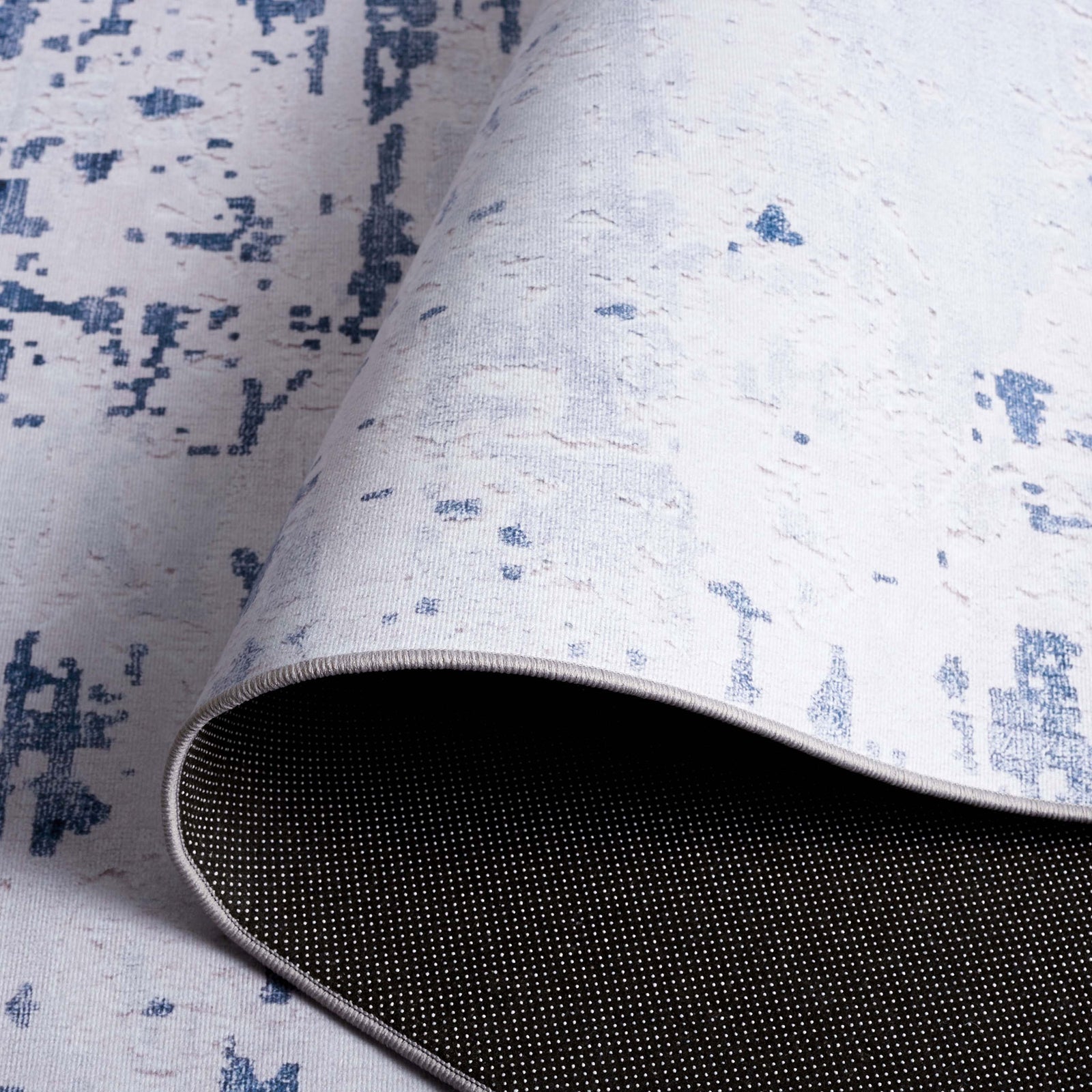 Slip-resistant dotted backing and flexible rug construction || TAC864F-5 || backing_studio