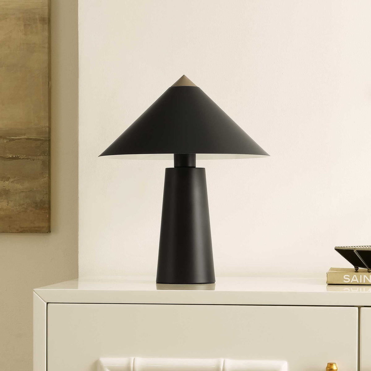 Chic black and gold lamp adds sculptural modern style to consoles, desks, and nightstands. || TBL4531A || front_angle_room