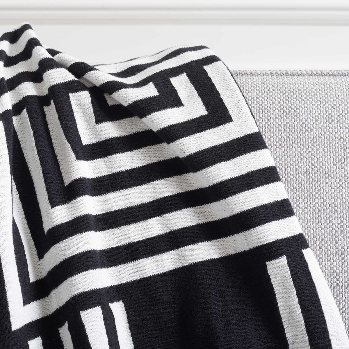Soft texture with crisp black and ivory lines for a sharp, contemporary finish