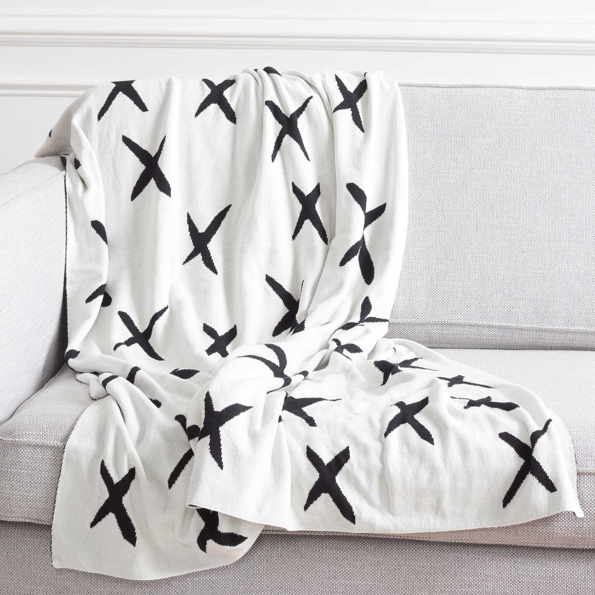 Generous, cozy throw showcases a playful X pattern that elevates modern decor || THR404A-5060 || back_room