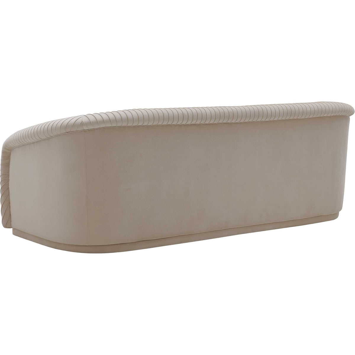 A smooth upholstered back meets pleated trim and a slim, low base in warm beige velvet