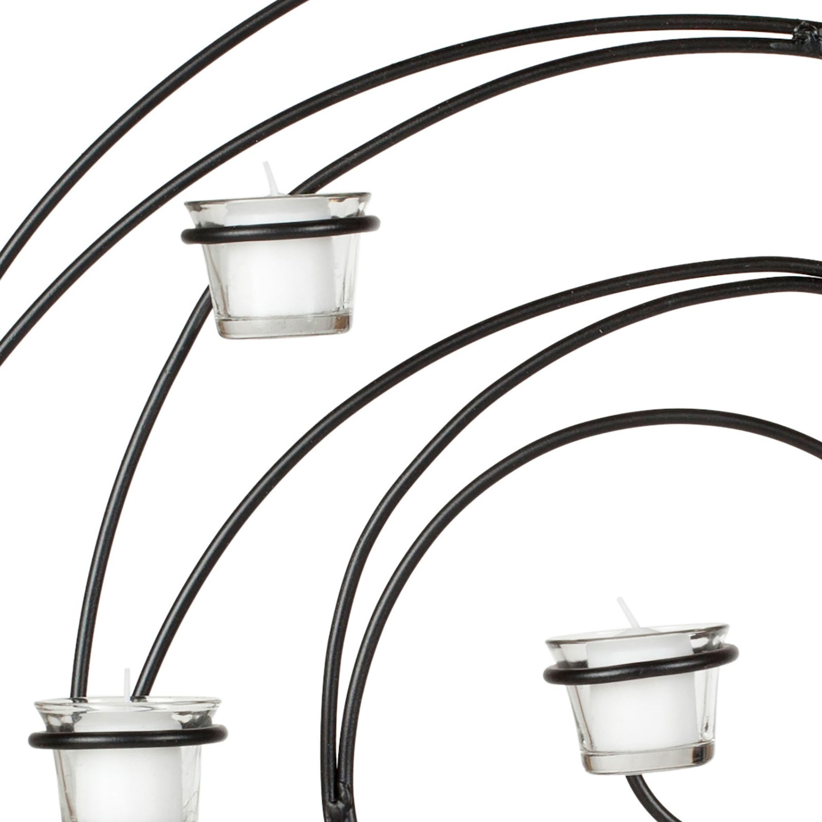 Clear glass cups cradle white votives along sweeping black iron curves || WDC1011A || detail_studio