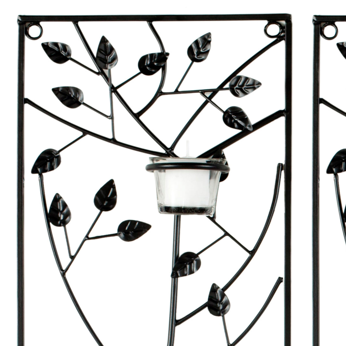 Sculpted black iron leaves surround a glass votive cup for delicate botanical texture || WDC1013A || detail_studio