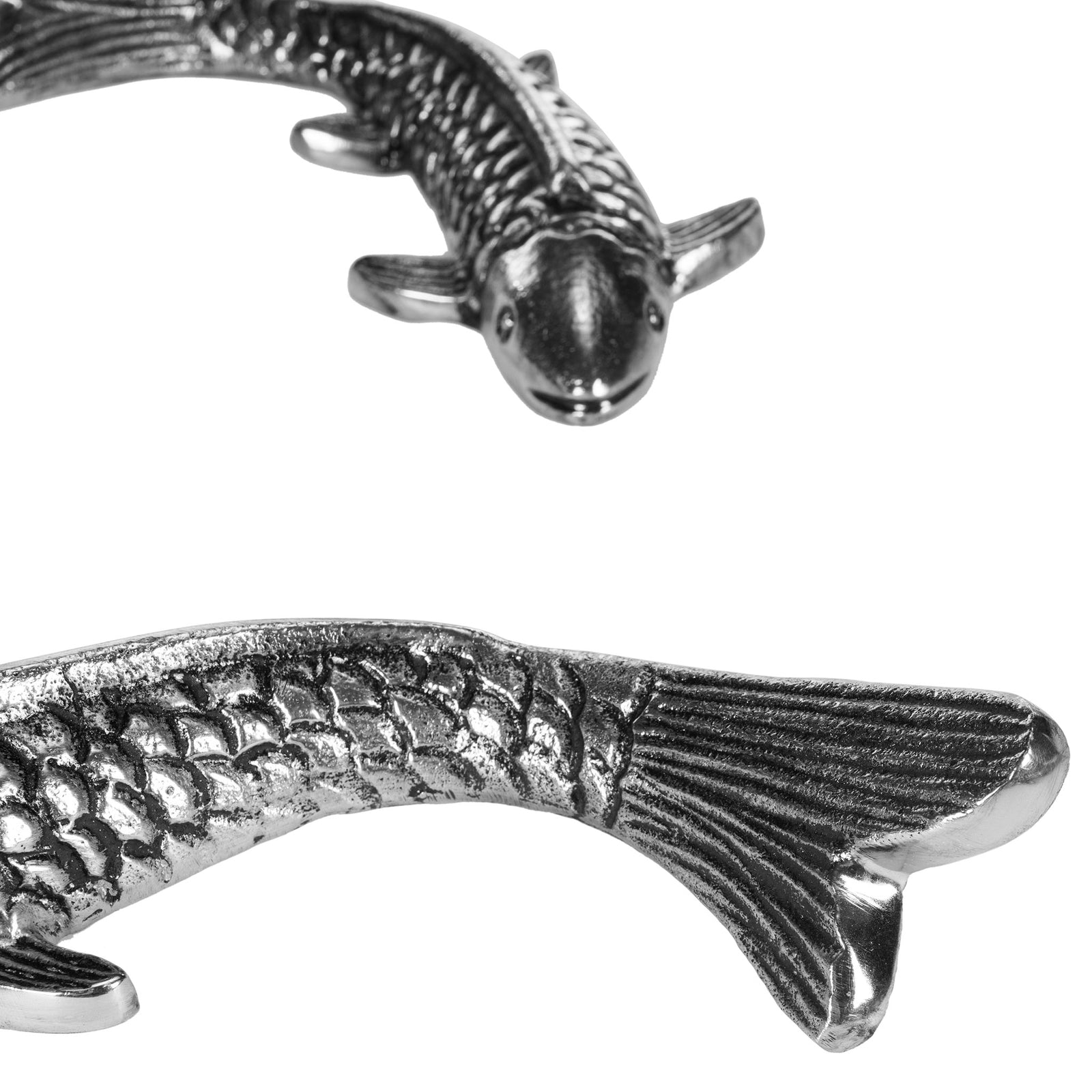 A lifelike koi face, patterned scales and a grooved tail reveal fine antique silver detailing || WDC1025A || detail_studio