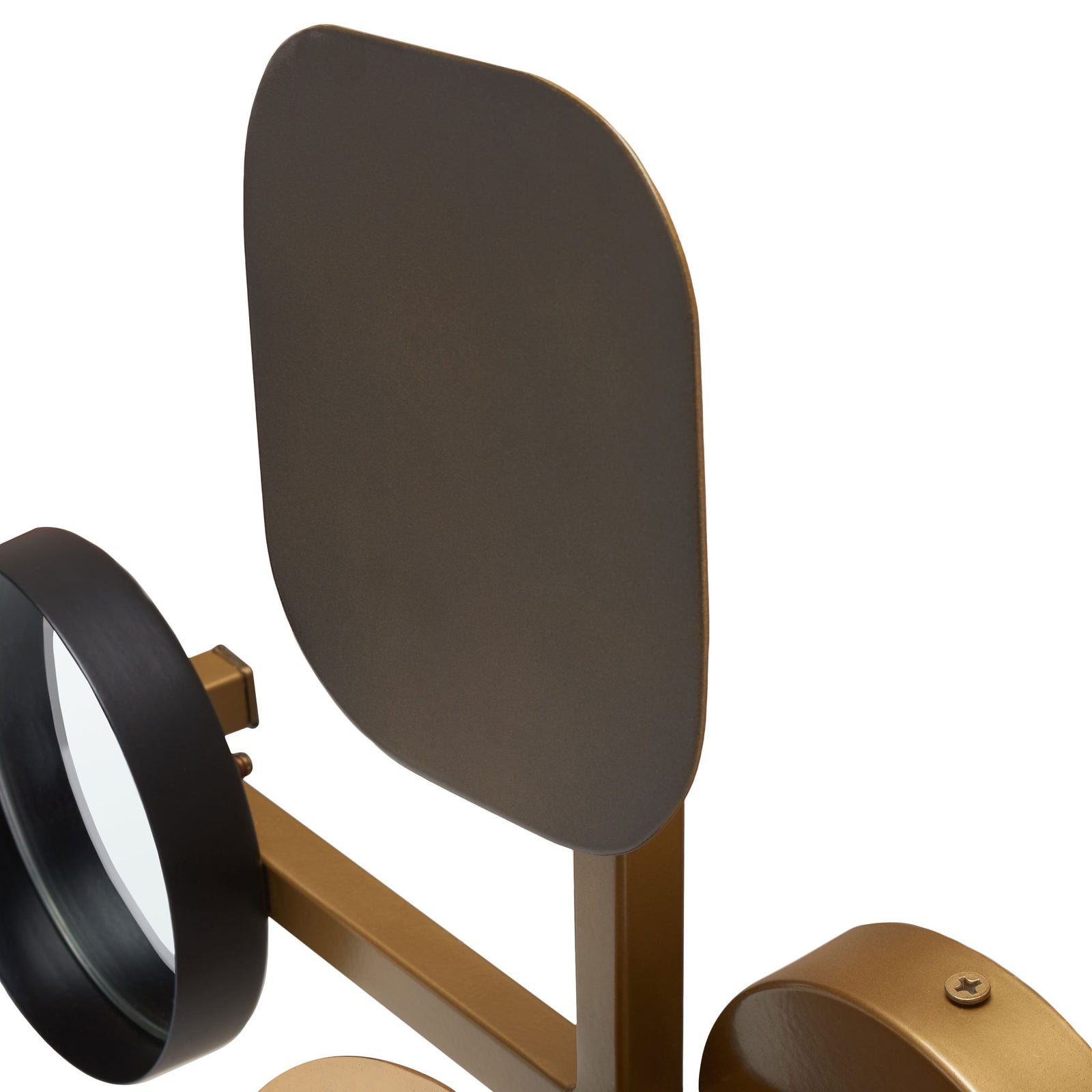 A smooth dark metal panel joins antique brass-finished arms and a round mirrored accent || WDC1030A || detail_studio