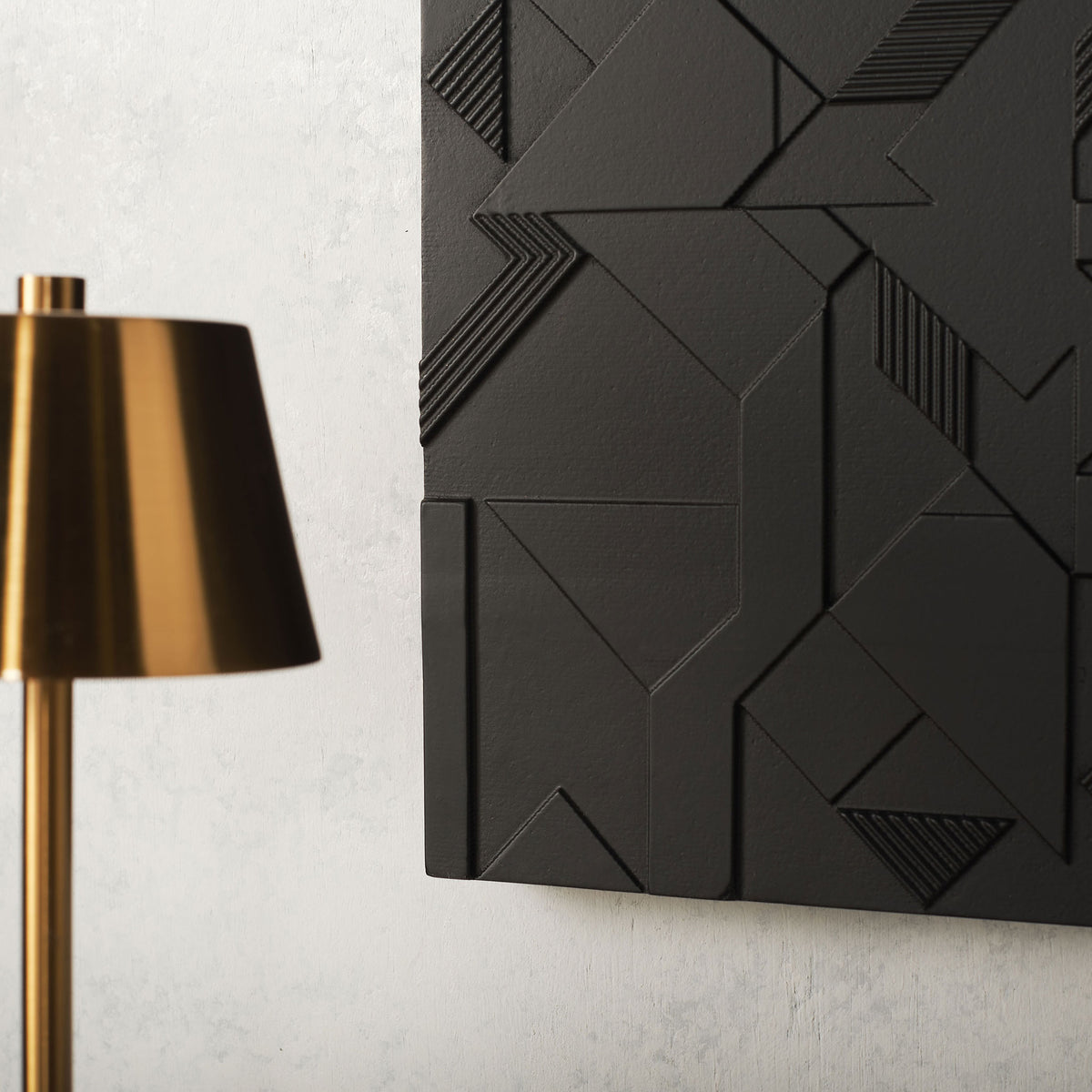 Layered black shapes and ribbed accents lend rich dimension to this modern wall art. || WDC5023A || detail_room