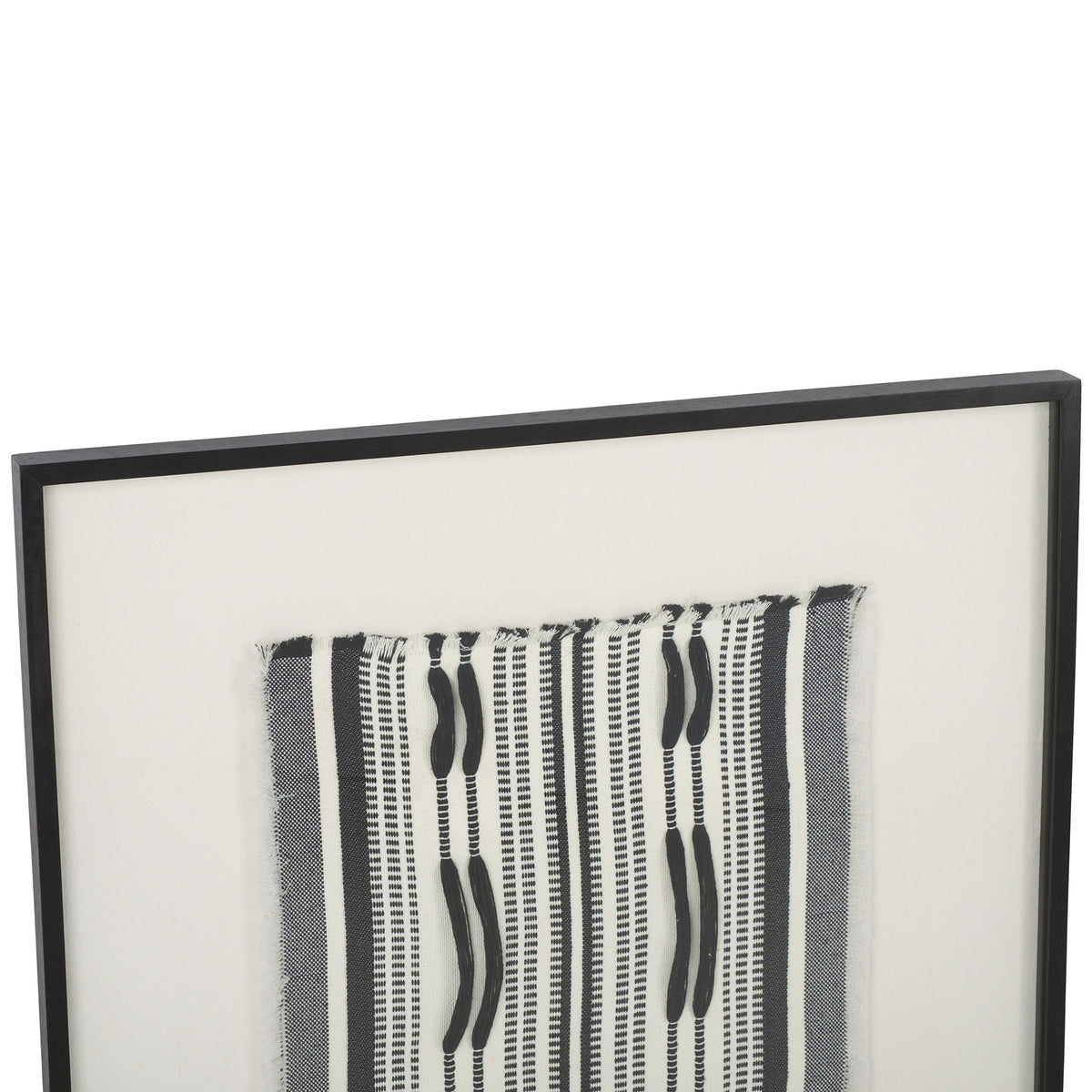 A slim black frame gives the woven black-and-white textile art a crisp, modern edge. || WLA1900A || detail_studio