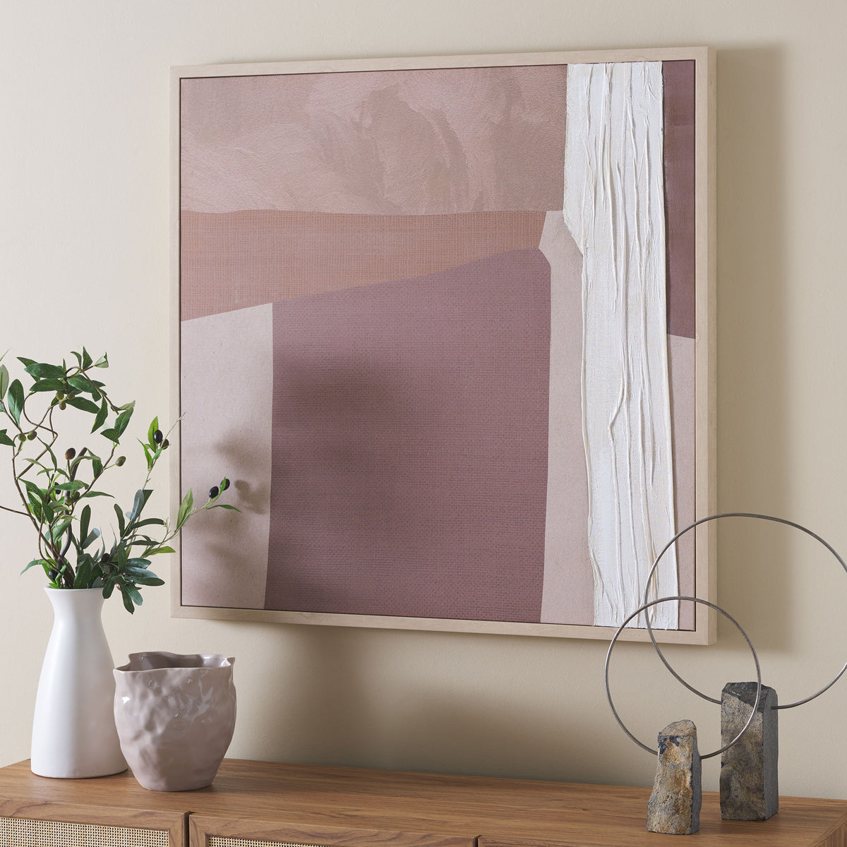 Soft brown geometry and a textured ivory accent bring warmth to the wall above a wood cabinet || WLA3015A || front_angle_room
