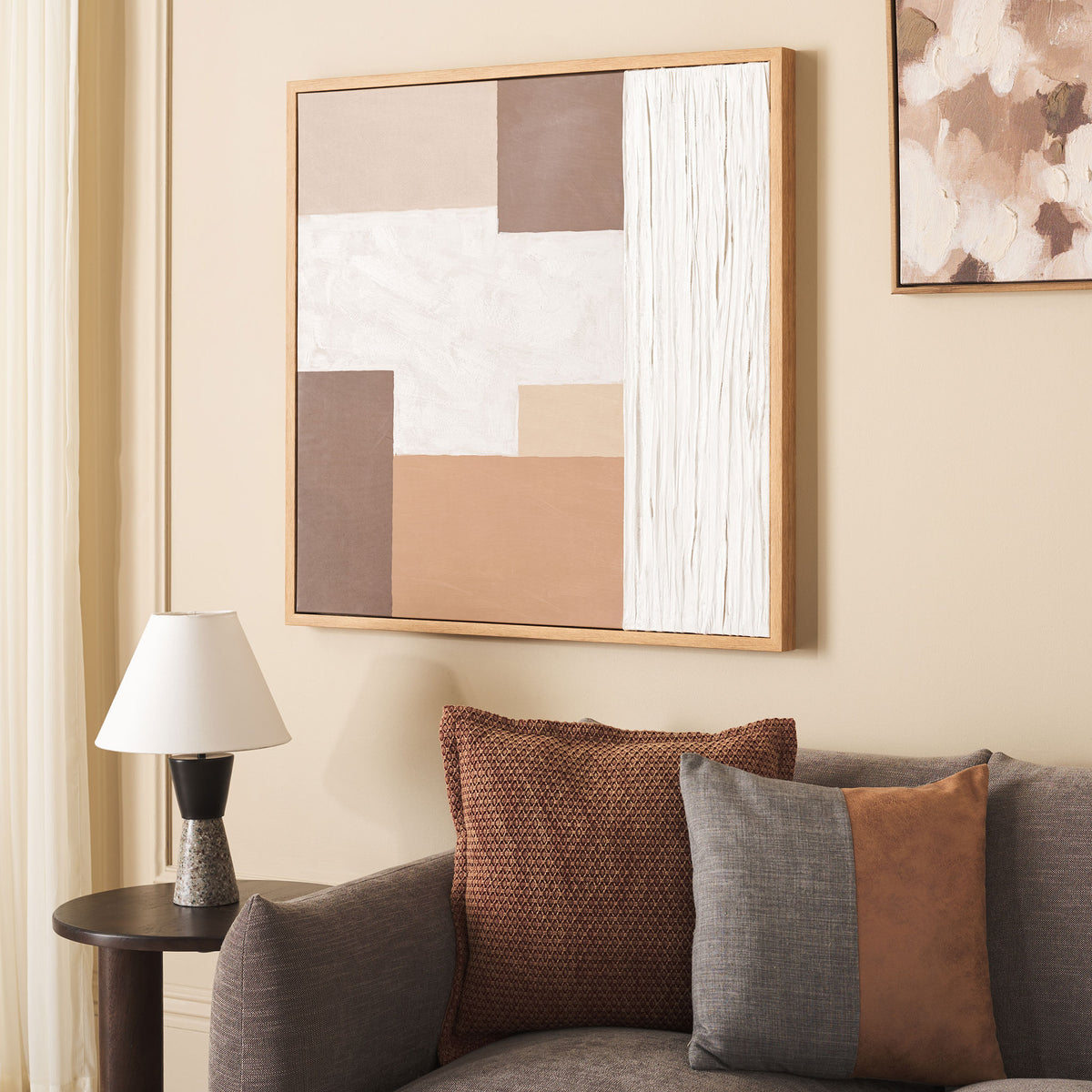 Textured off-white sections contrast with geometric earth tones on this framed canvas || WLA3017A || front_angle_room