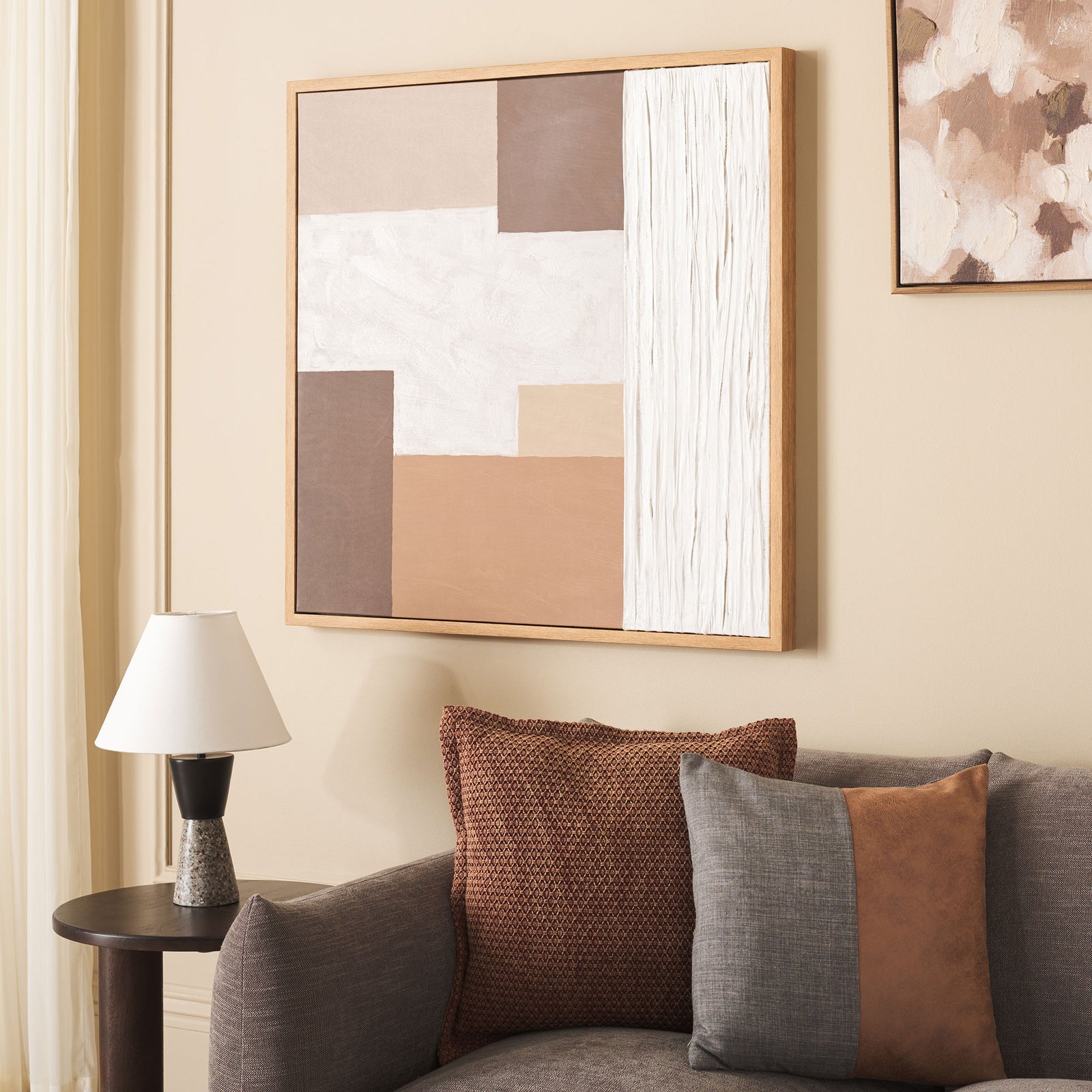 Textured off-white sections contrast with geometric earth tones on this framed canvas || WLA3017A || front_angle_room