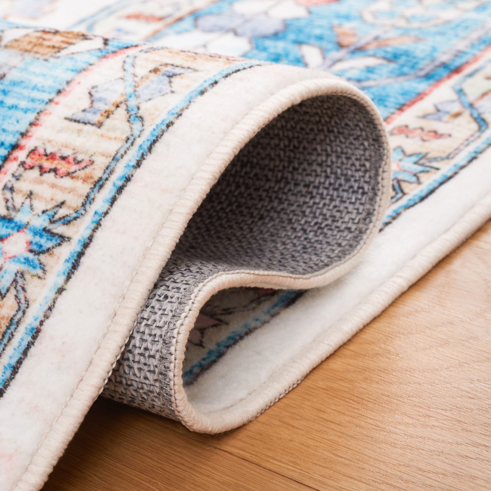 Flexible, low-profile rug edges roll smoothly, revealing cushy backing and neat serging || WPR322K-5 || fold_room