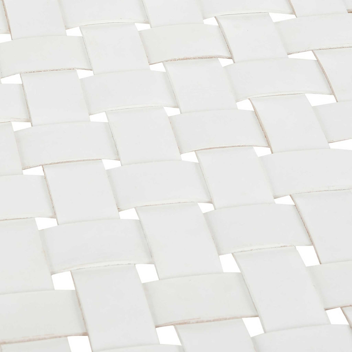 Interlaced white leather bands create a clean, airy basket-weave texture.