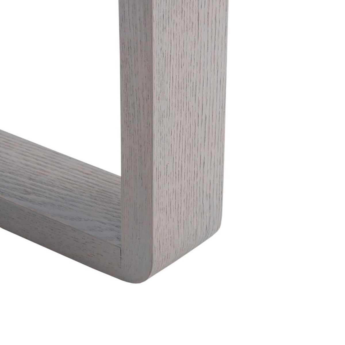 Gray wood-grain leg curves into a low horizontal base for an open frame