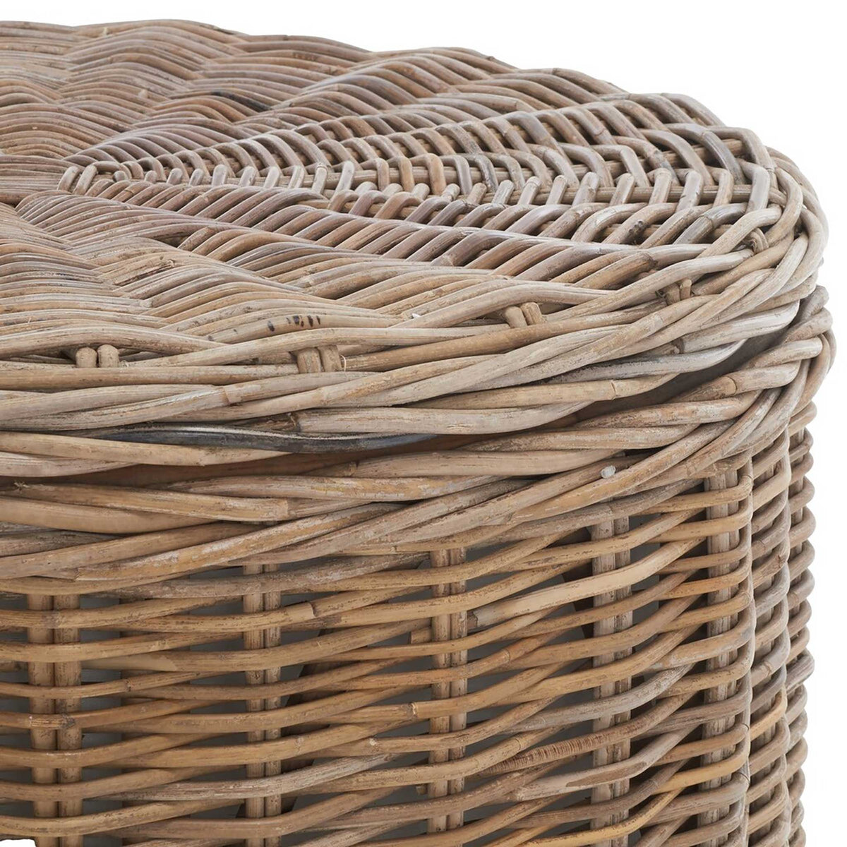 Braided edging frames the intricate rattan weave of the round storage table lid.