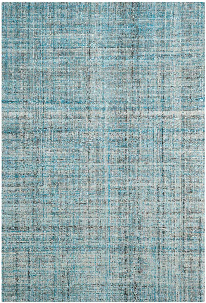 Blue 6' x 9' rug has densely layered lines and a lively, variegated finish