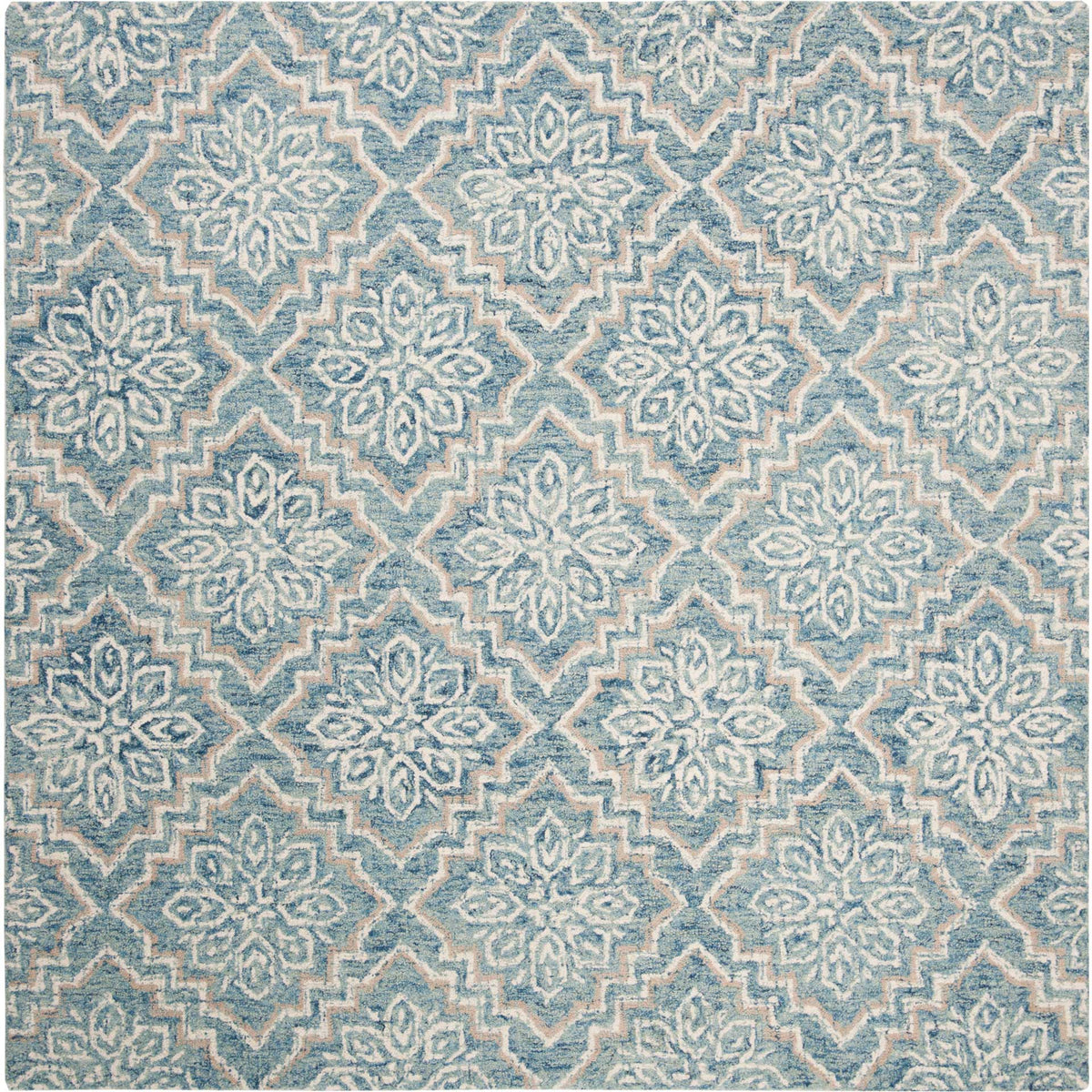 Square blue and gray wool rug displays bold floral medallions within a geometric lattice.