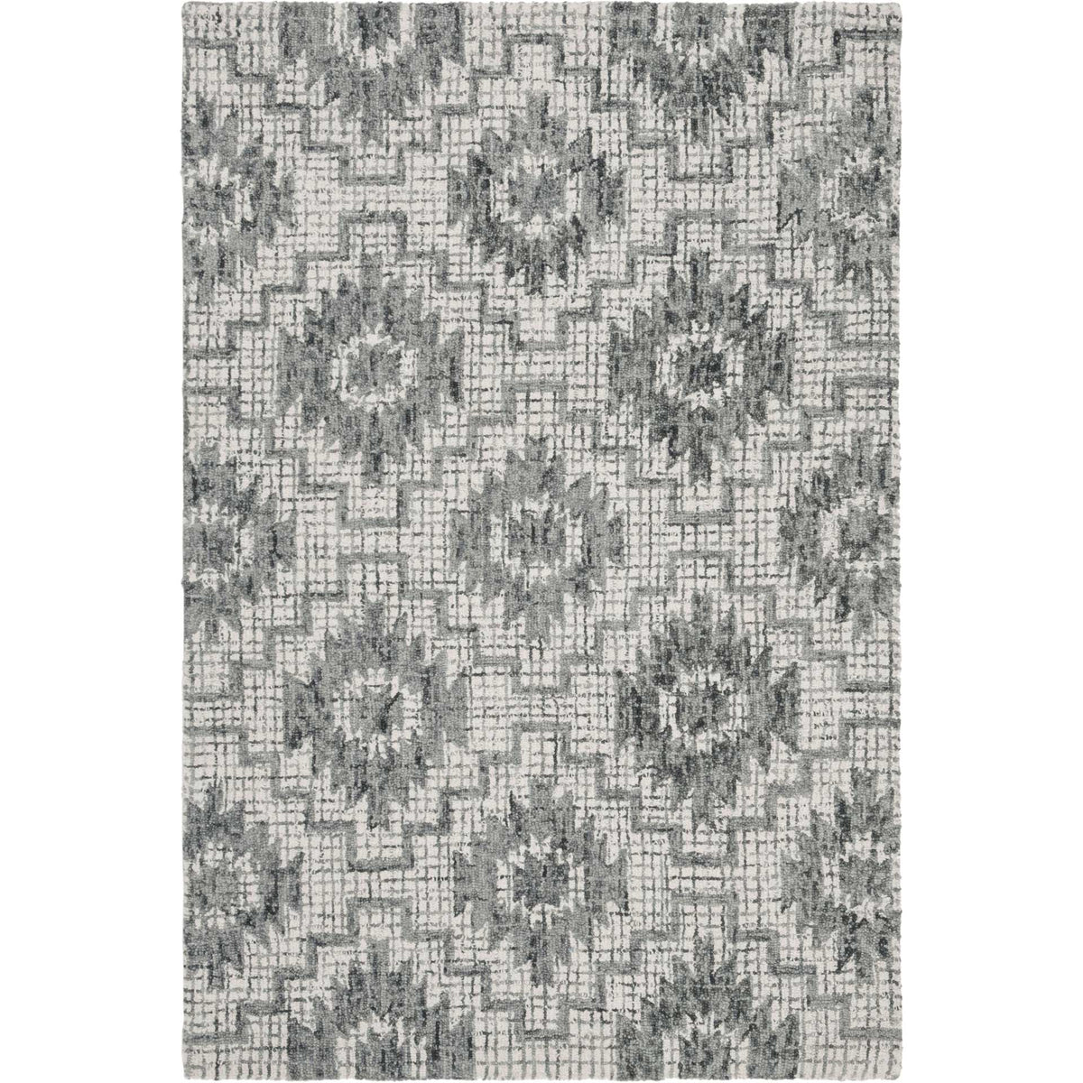 Ivory wool rug with bold dark gray medallions and a softly weathered geometric pattern