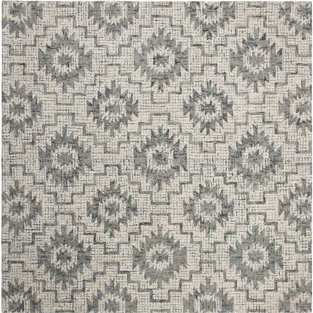 Square ivory rug with dark gray starburst medallions and interlocking geometric outlines