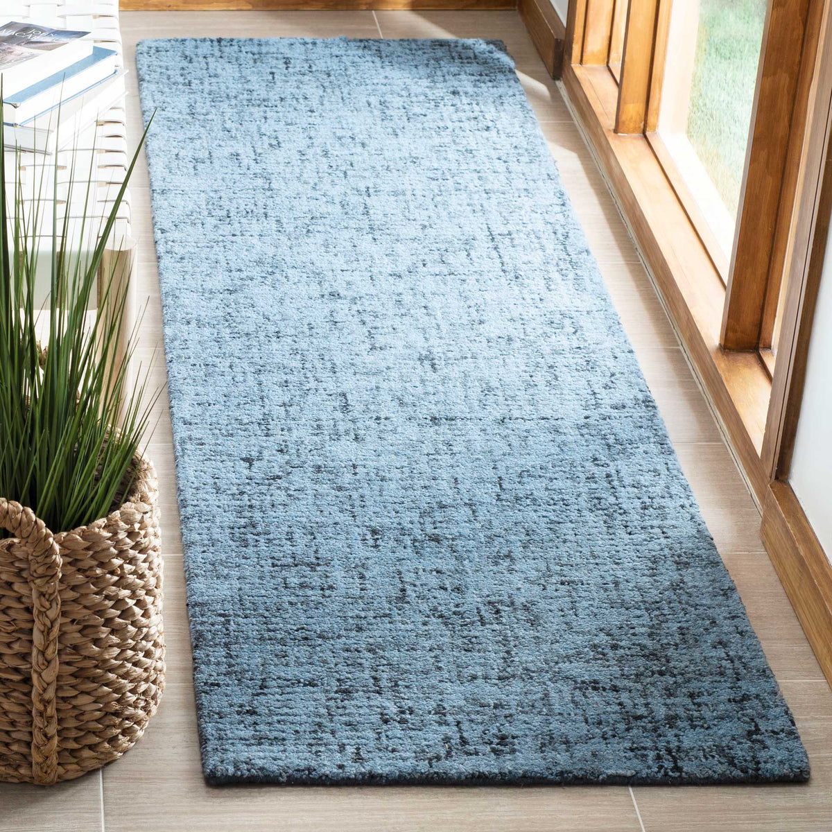 Hand-tufted blue runner with subtle color variation and an inviting wool pile
