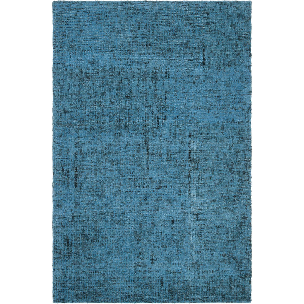 Light and deep blues intermingle in a textured, subtly distressed wool rug.