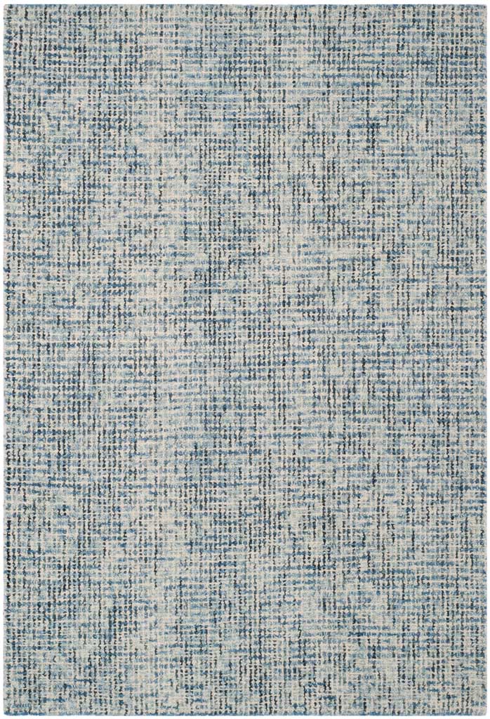 Cool blue and charcoal speckles give this rectangular area rug a calm, textured finish.