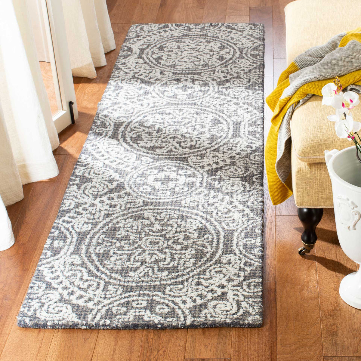 Hand-tufted wool runner adds soft texture and timeless pattern to a room