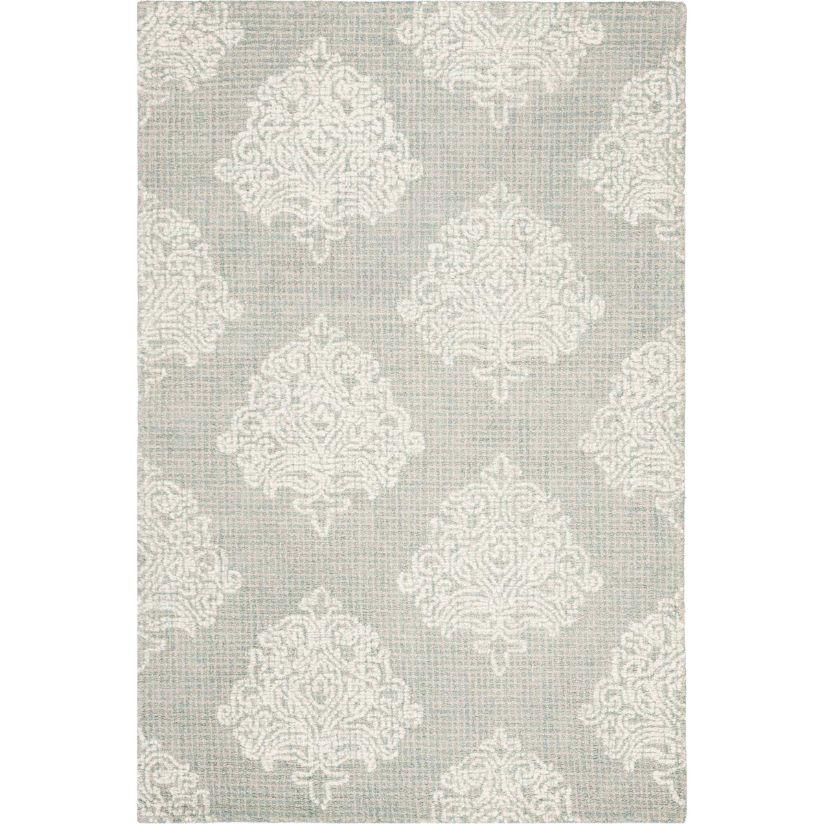 Small rectangular wool rug with ivory scrollwork medallions over a muted aqua ground.
