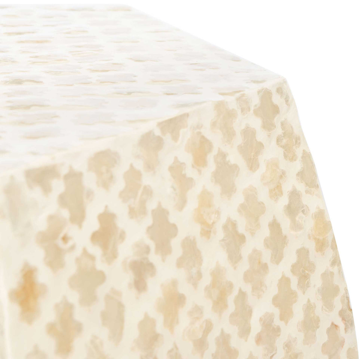 Warm ivory capiz shell inlay forms a delicate trellis along the softly angled tabletop edge