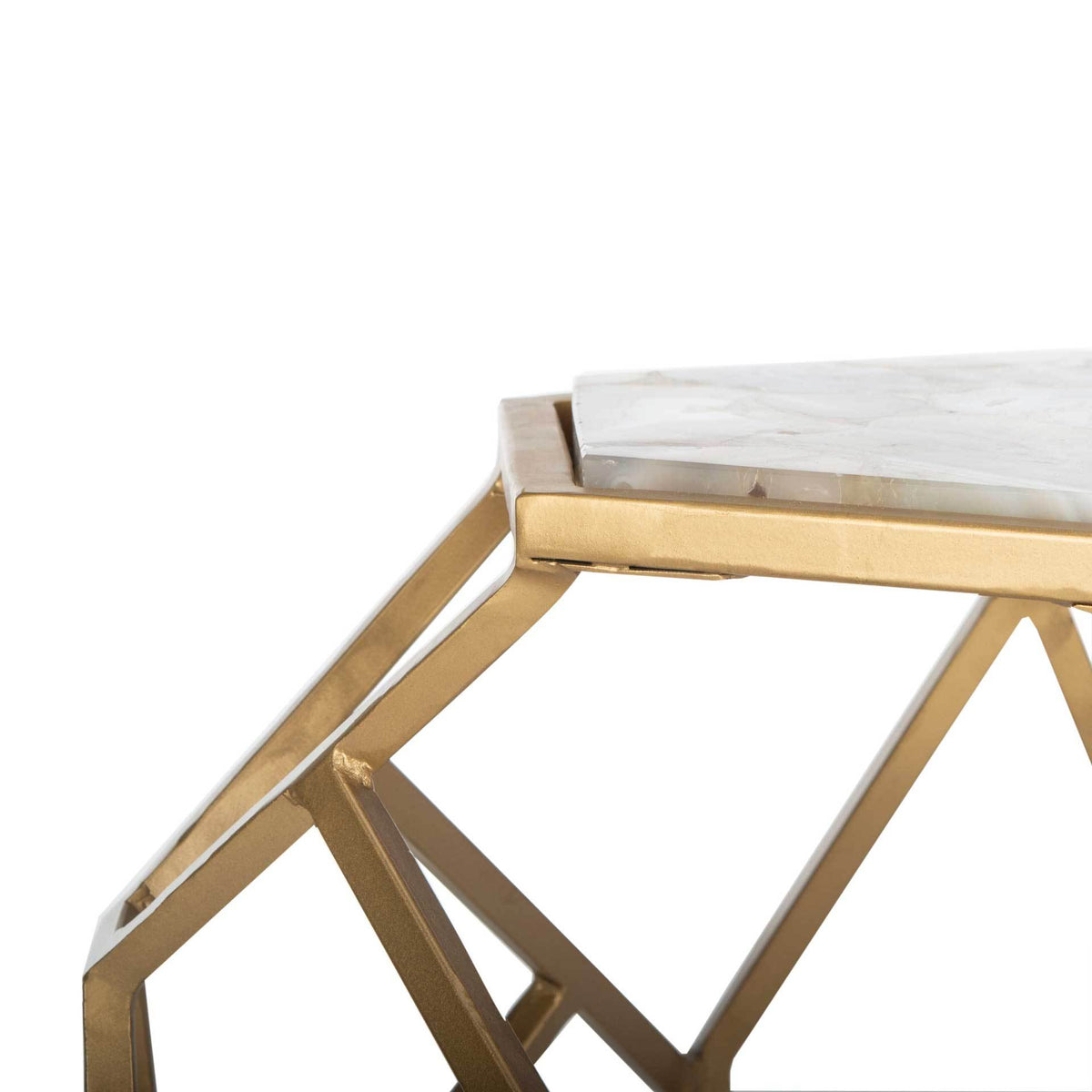 A smooth agate slab sits within a gold-toned rim above angular metal supports.