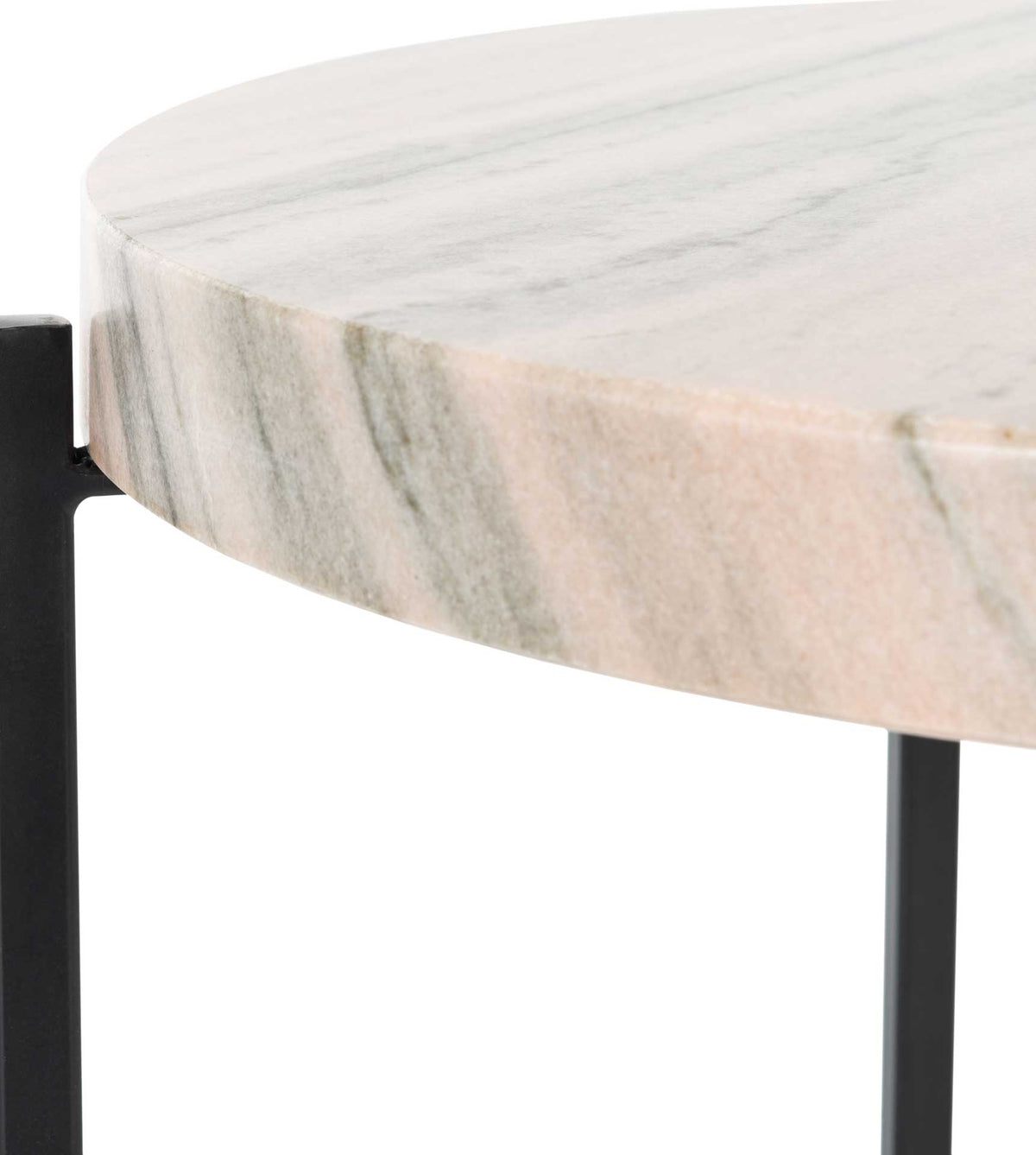 Soft gray and warm peach veining accent the smooth surface and thick edge of the marble tabletop